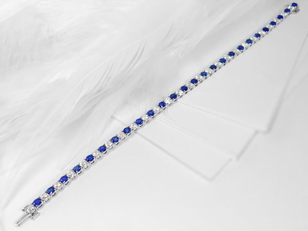 18k White Gold 4 Claw Tennis Bracelet With 26 Round Brilliant Diamonds Totalling 3.45ct And 26 Blue Sapphire's Totalling 5.37ct Gold Weighing Approx. 10.20grams