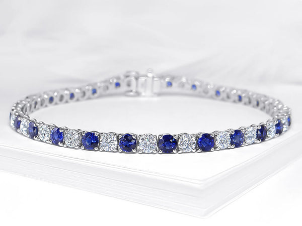 18k White Gold 4 Claw Tennis Bracelet With 26 Round Brilliant Diamonds Totalling 3.45ct And 26 Blue Sapphire's Totalling 5.37ct Gold Weighing Approx. 10.20grams
