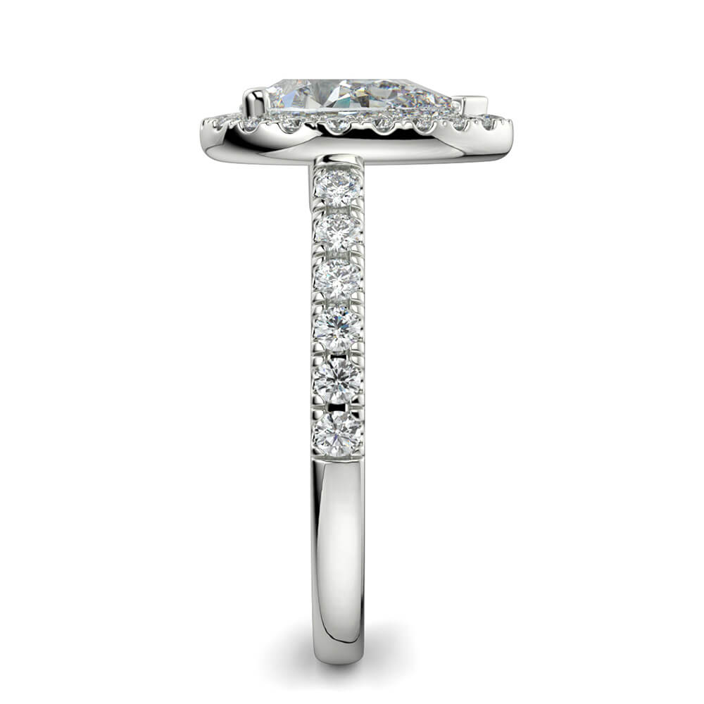 Single halo store engagement ring