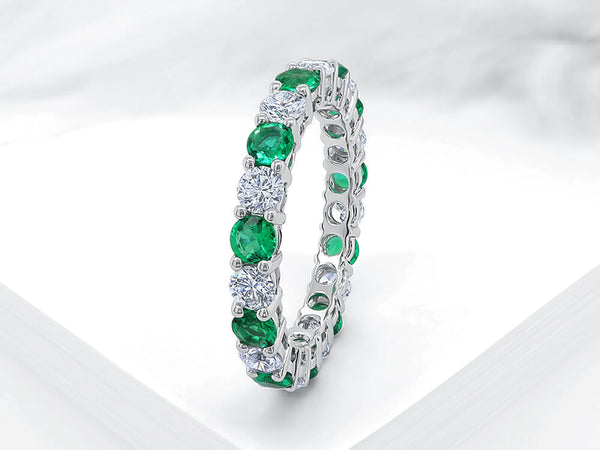 Four Claw Diamond and Emerald Eternity Ring - Ian Sharp Jewellery