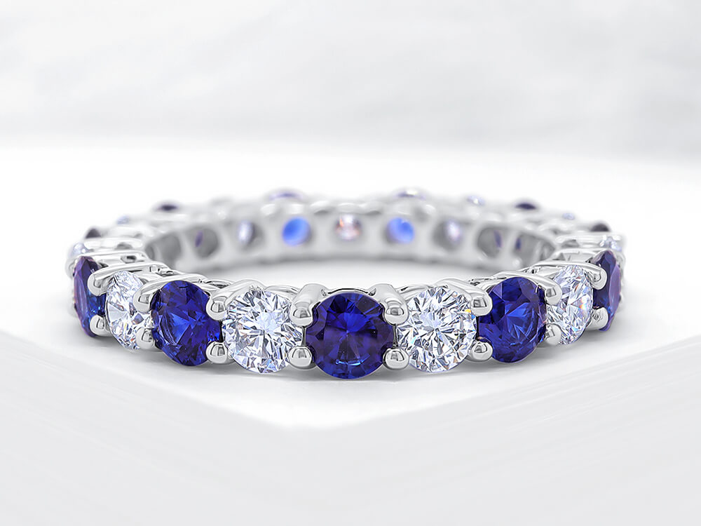 Four Claw Diamond and Sapphire Eternity Ring - Ian Sharp Jewellery