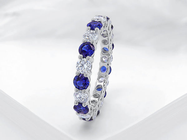 Four Claw Diamond and Sapphire Eternity Ring - Ian Sharp Jewellery