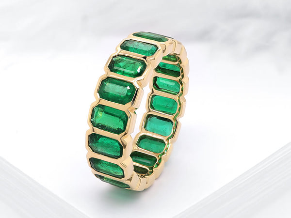 Stunning Emerald Shaped Emerald Eternity Ring - Ian Sharp Jewellery