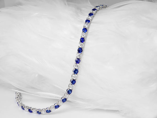 18k White Gold 4 Claw Tennis Bracelet With 26 Round Brilliant Diamonds Totalling 3.45ct And 26 Blue Sapphire's Totalling 5.37ct Gold Weighing Approx. 10.20grams