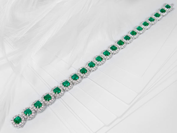 Flattering Emerald & Diamond Dress Tennis Bracelet - Ian Sharp Fine Jewellery