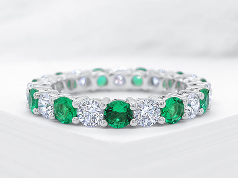 Four Claw Diamond and Emerald Eternity Ring - Ian Sharp Jewellery